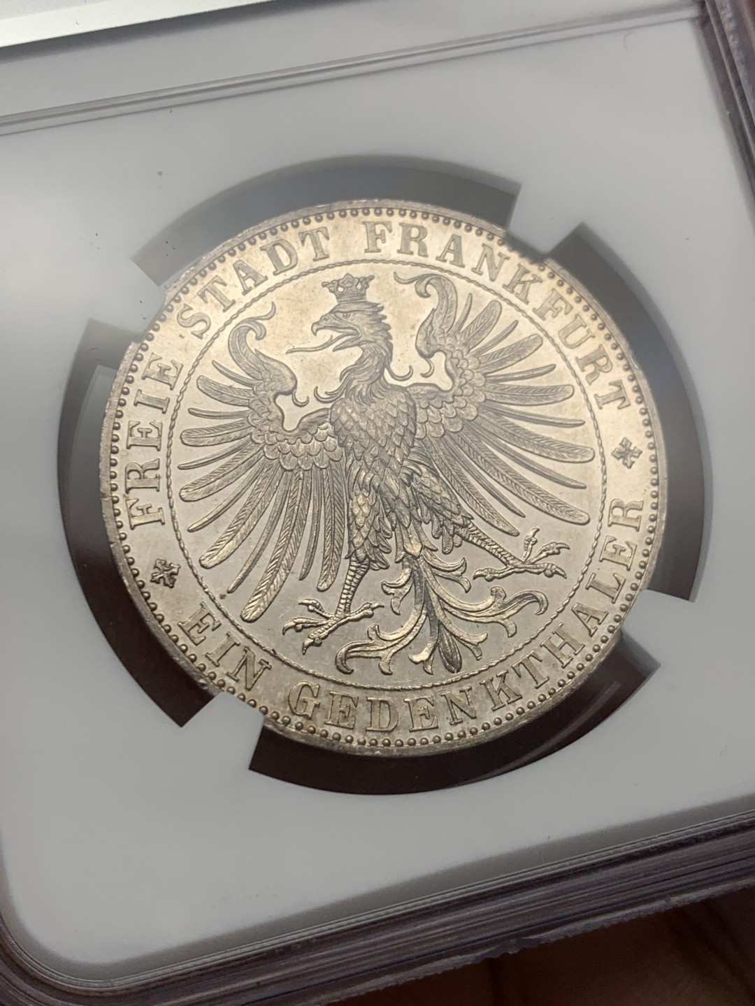 《竞宝斋》第149场-周日，周一，周四 3场 (全场包邮) NGC-MS63PL 德国1863年王子会议泰勒银币，也称著名的法兰克福市政厅景观泰勒，带PL尾巴的很少，NGC数据库中带PL后缀的仅有两枚，绝佳镜面效果！