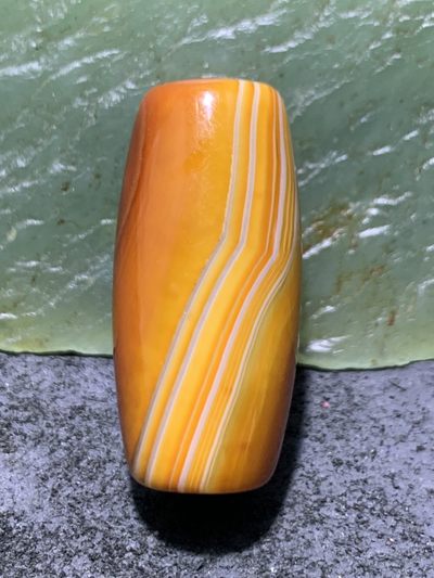 精美高玉化天眼千层纹纹缠丝玛瑙桶珠一颗， 精美高玉化天眼千层纹纹缠丝玛瑙桶珠一颗，