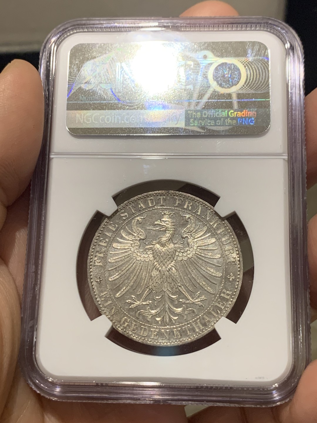 《竞宝斋》第149场-周日，周一，周四 3场 (全场包邮) NGC-MS63PL 德国1863年王子会议泰勒银币，也称著名的法兰克福市政厅景观泰勒，带PL尾巴的很少，NGC数据库中带PL后缀的仅有两枚，绝佳镜面效果！