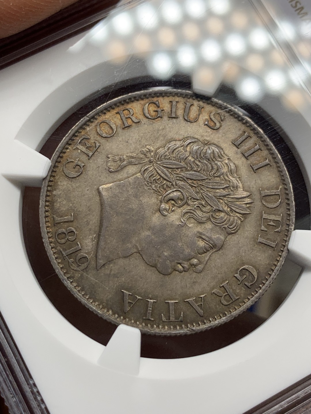 《竞宝斋》第150场-周日，周一，周四 3场 (全场包邮) NGC MS62 英国 1819 乔治三世半克朗 银币，小头版比牛头少，较少年份。英国CGS78分砸盒，不止62分状态，醇厚包浆，背面金彩