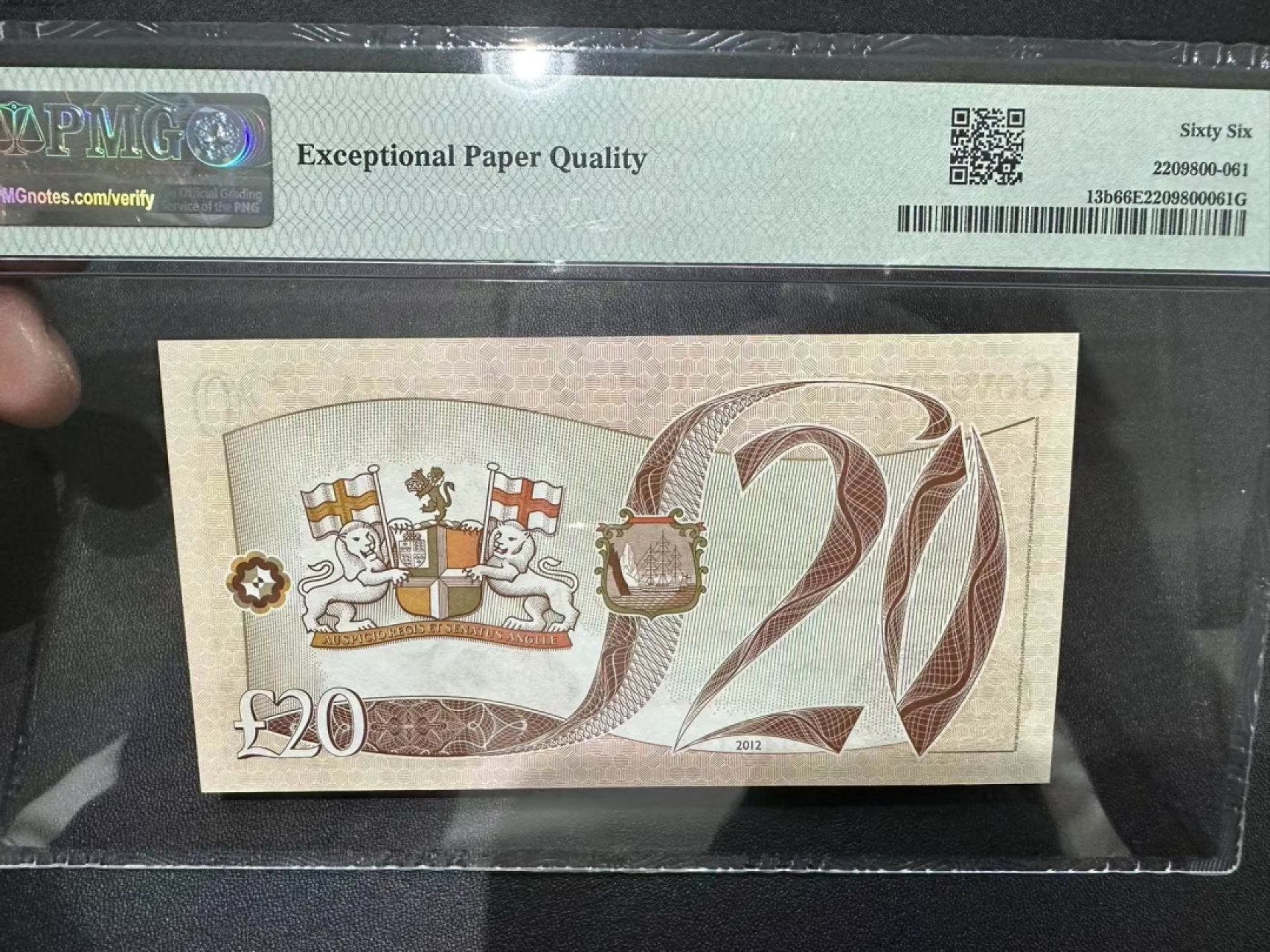 《外钞收藏家》第二百五十六期（评级场） 2012年圣赫勒拿群岛20镑 A/1冠 乱蛇号 PMG66