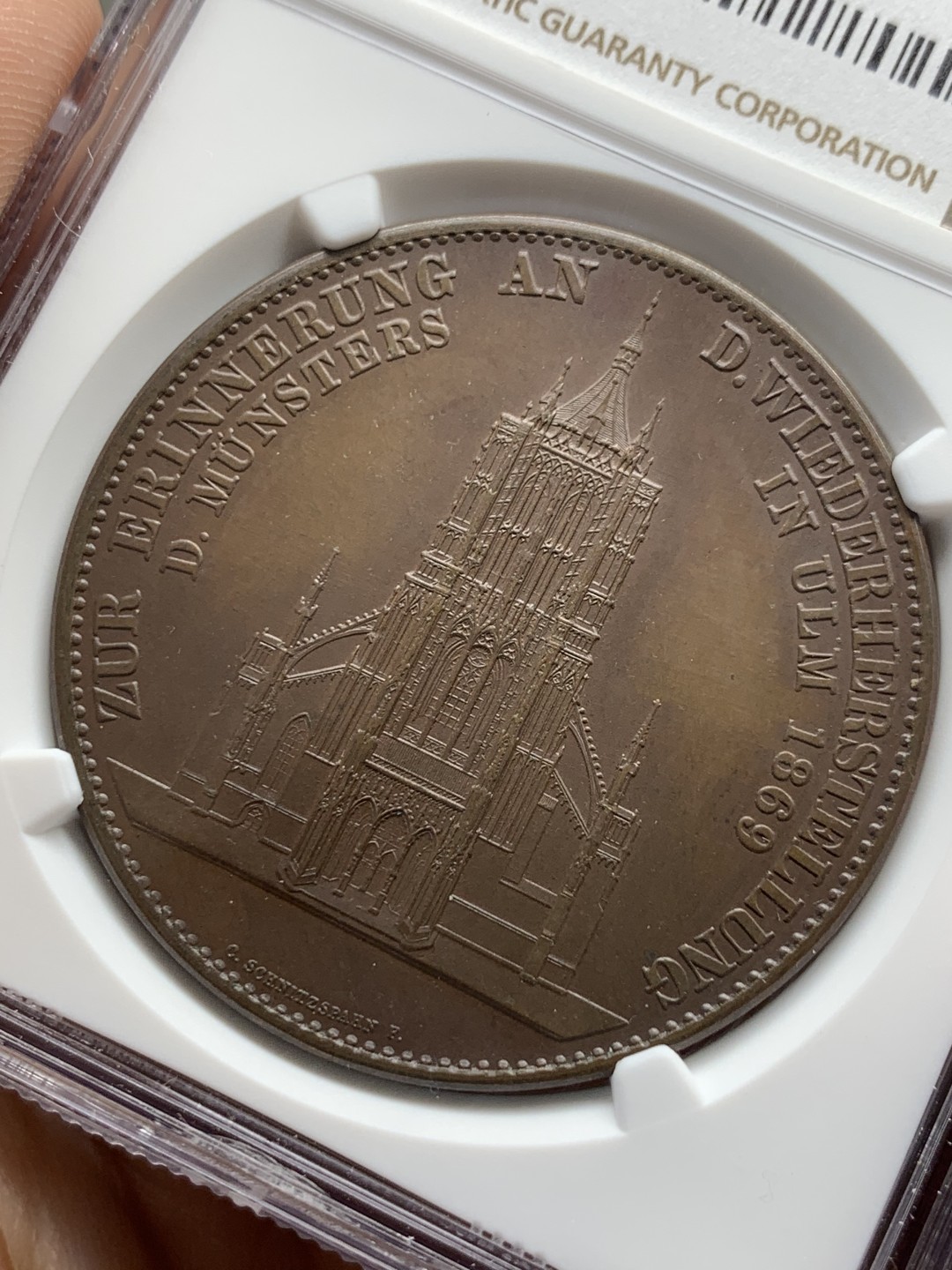 《竞宝斋》第150场-周日，周一，周四 3场 (全场包邮) NGC MS64 1890年德国乌尔姆大教堂纪念铜章 完美品相 巧克力包浆 十分迷人
