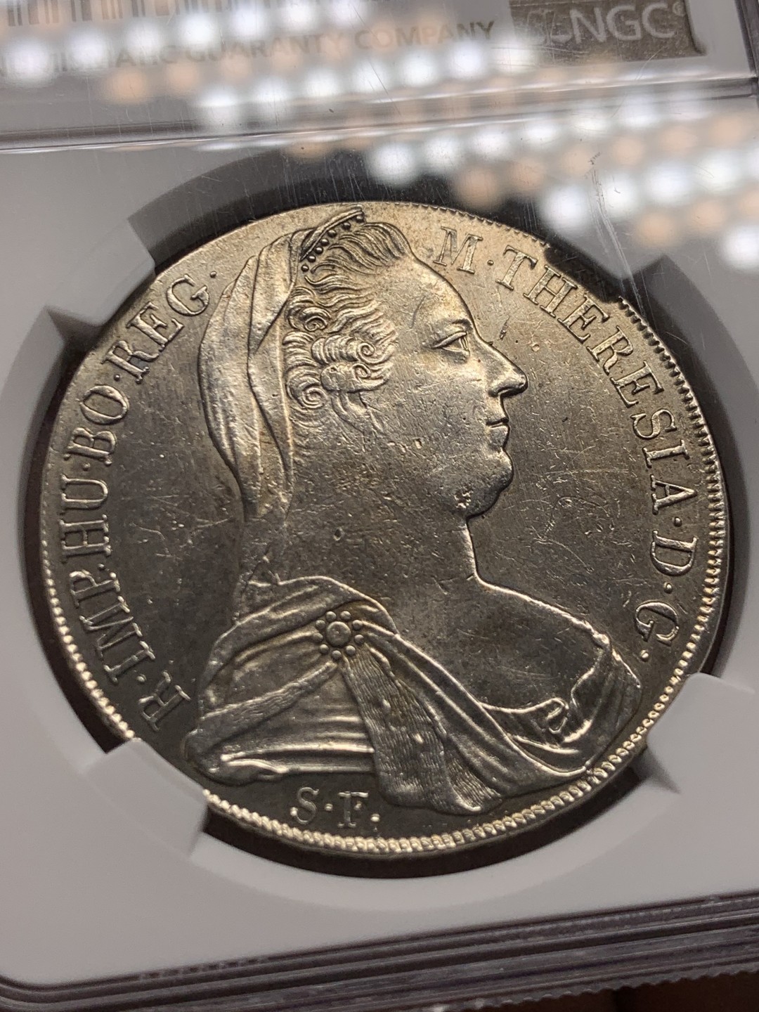 《竞宝斋》第150场-周日，周一，周四 3场 (全场包邮) NGC AU 米兰大扣版 特蕾西亚女王 1泰勒银币 1820左右铸造