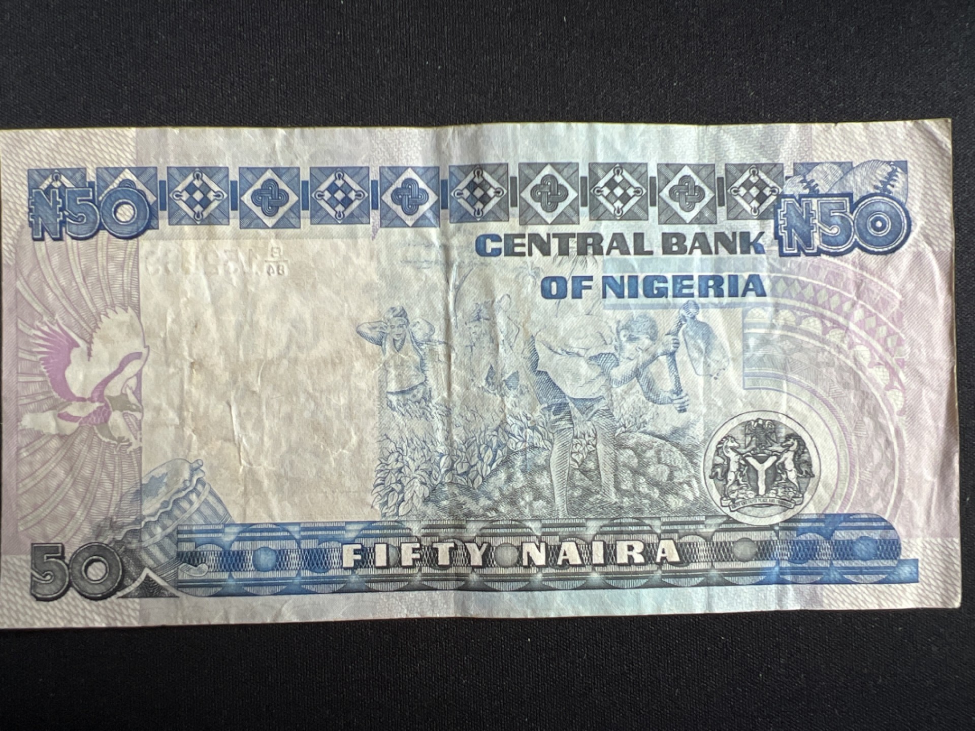 泡泡堂微拍第一 二 〇幕硬币、纸币捡漏可累计专场👿👿，累计满二十元包邮，接受代拍业务 旧版尼日利亚50奈拉