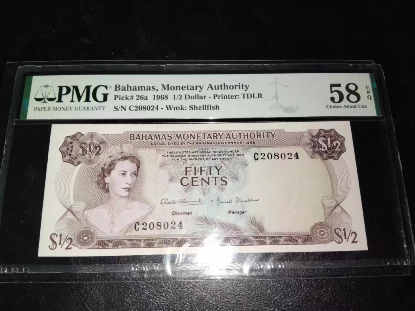 Chase Auction 第21期 - - 外钞、民国钞和人民币混合场！ 1968年巴哈马2元，女王彩背，PMG58e！