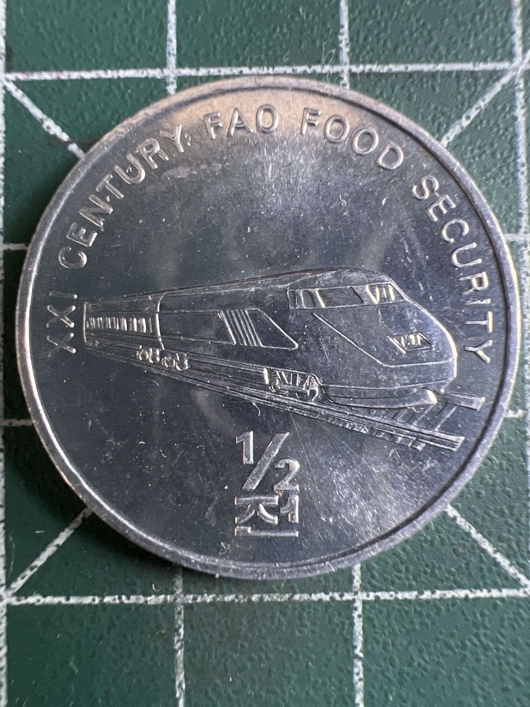 泡泡堂微拍第一 二 四幕硬币捡漏可累计专场👿👿，累计满二十元包邮，接受代拍业务 朝鲜21世纪食品安全纪念币