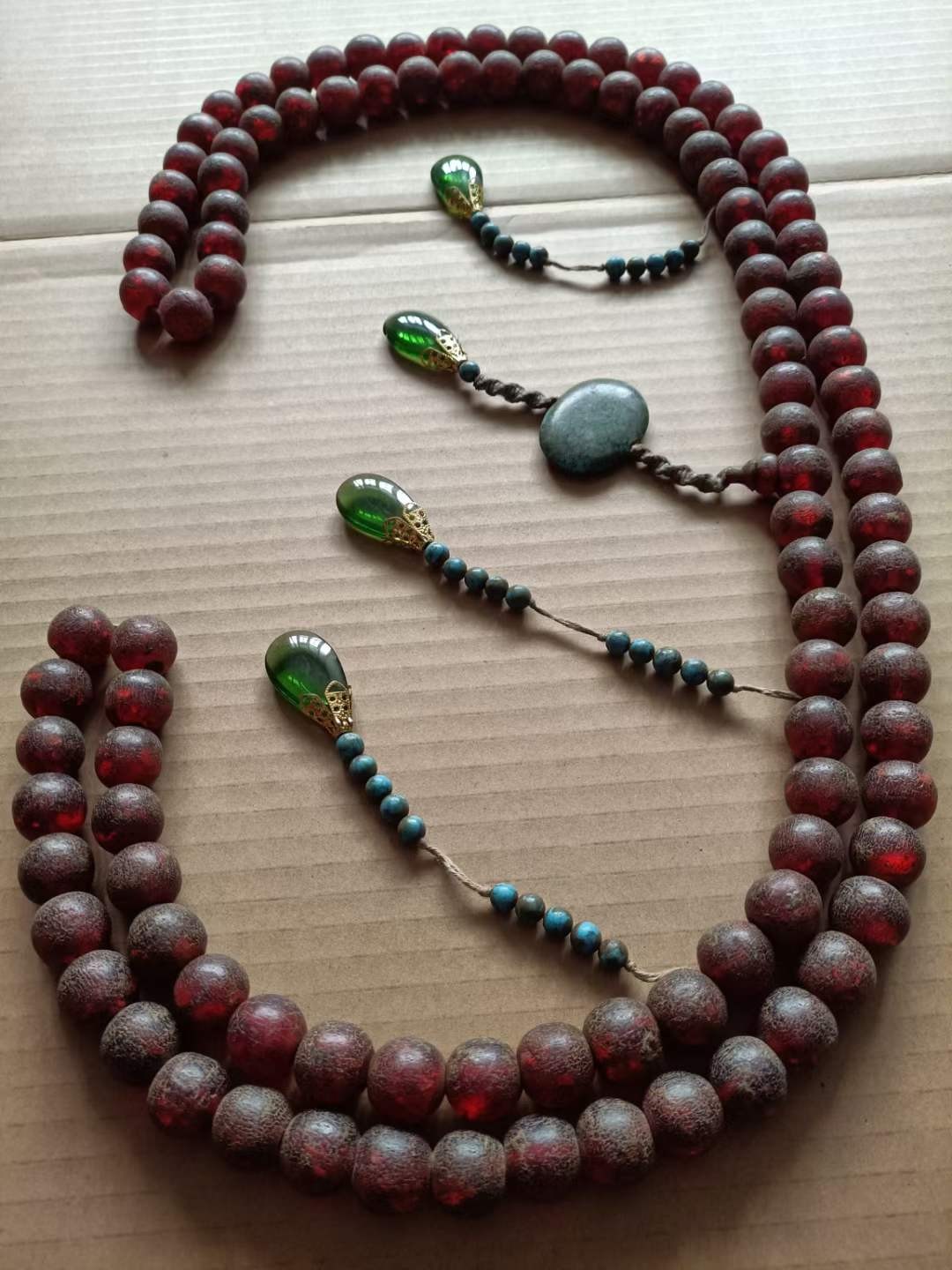 清代血珀朝珠保存完整开片自然包将浓厚喜欢的联系收藏佳品