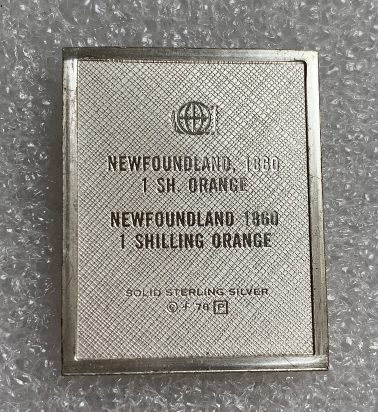 瓶子🏺第87期拍卖会 纽芬兰1860年1先令银质邮票  世界邮政后铸  9.24g