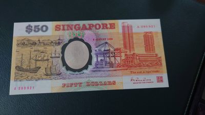 【世界钱币收藏】精选微拍第58期暨2023年第五期 新品裸钞评级币混合场 - 1990年新加坡独立25周年纪念钞 A冠带日期 全新绝品原装册无47