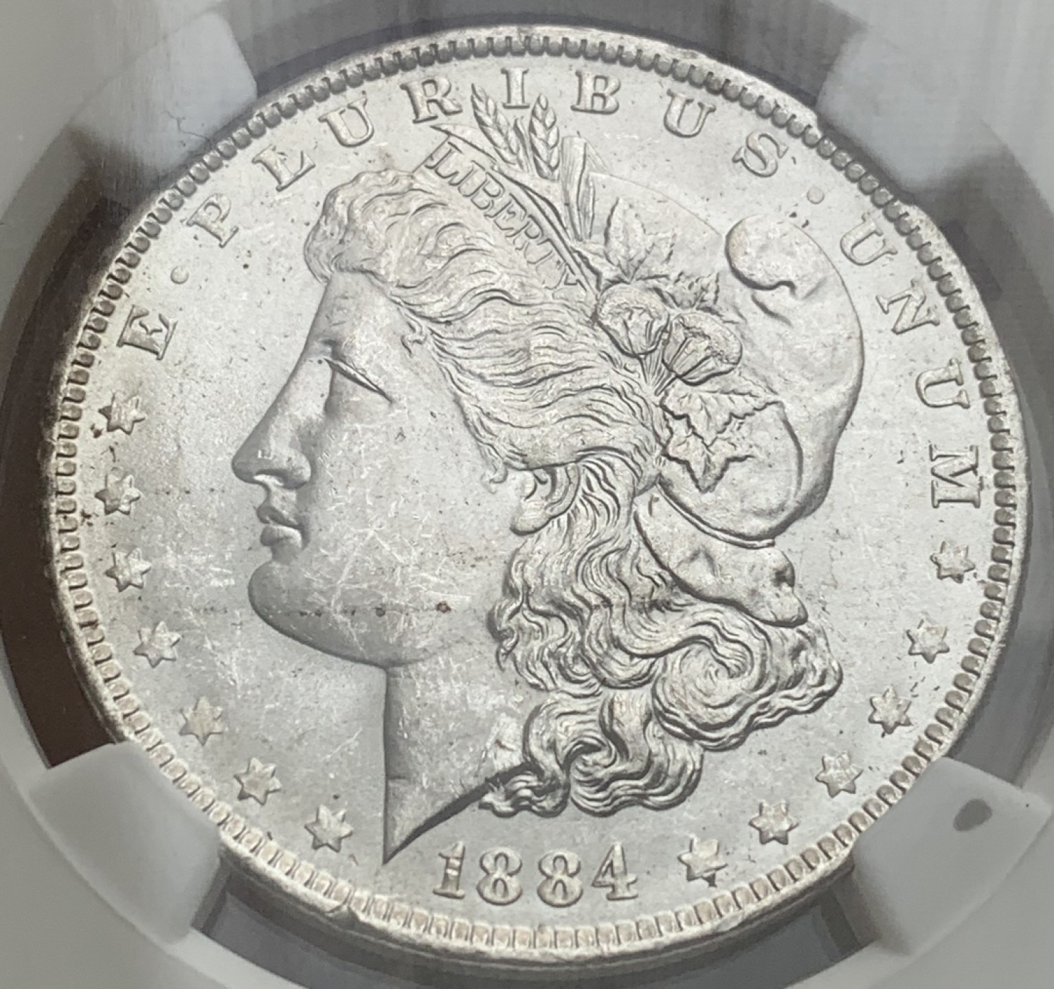 瓶子🏺第87期拍卖会 美国1884年1美元摩根大银币O版NGC MS64