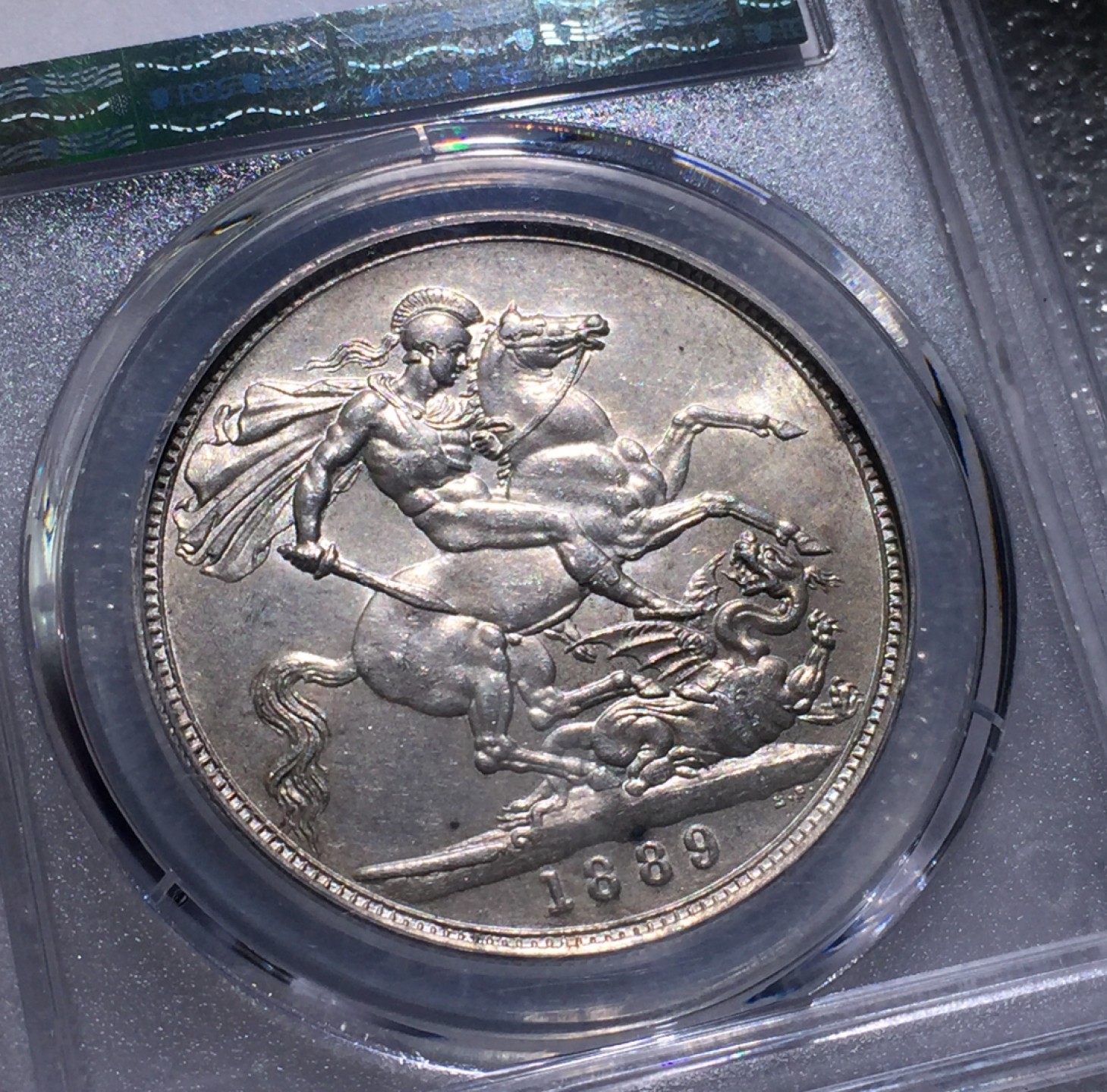 方圆集藏第三期专场 11240-PCGS61分英国1889年维多利亚高冠版马剑银币