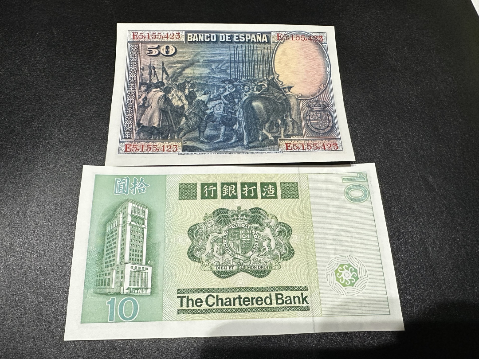 《外钞收藏家》第二百六十二期（连拍第二场） 1928年西班牙50+1981年渣打银行10元 两张一起 全新UNC