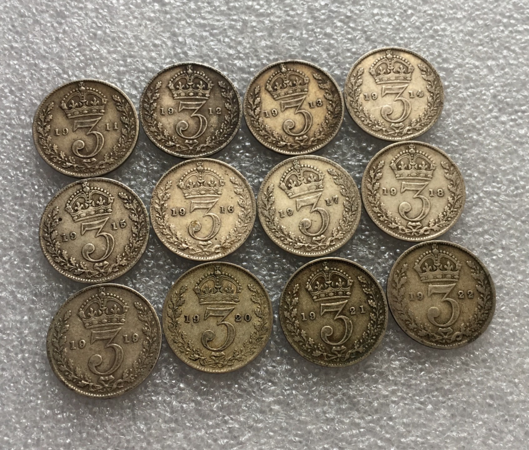 方圆集藏第三期专场 11229-英国1911-1922年12年连号乔五3便士银币