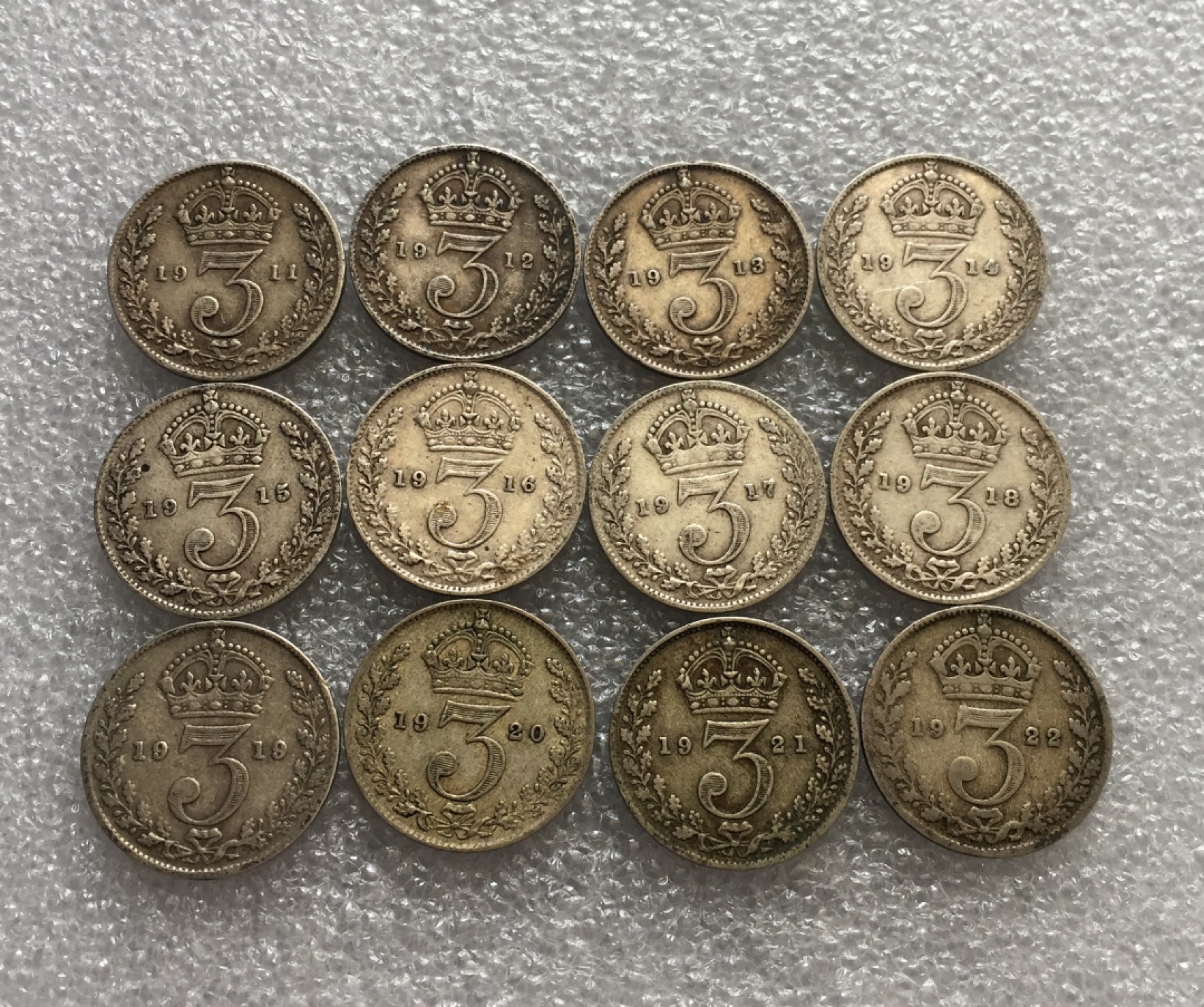 方圆集藏第三期专场 11229-英国1911-1922年12年连号乔五3便士银币