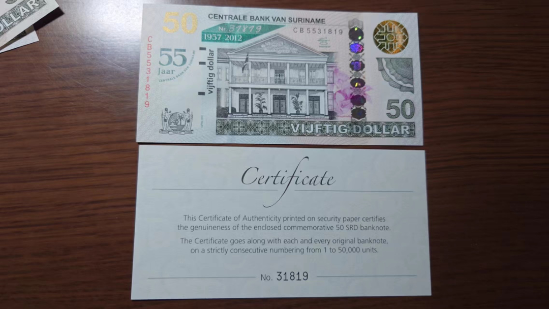 【世界钱币收藏】精选微拍第58期暨2023年第五期 新品裸钞评级币混合场 2012年苏里南50元纪念钞 全新绝品无47尾号1819 原册证书