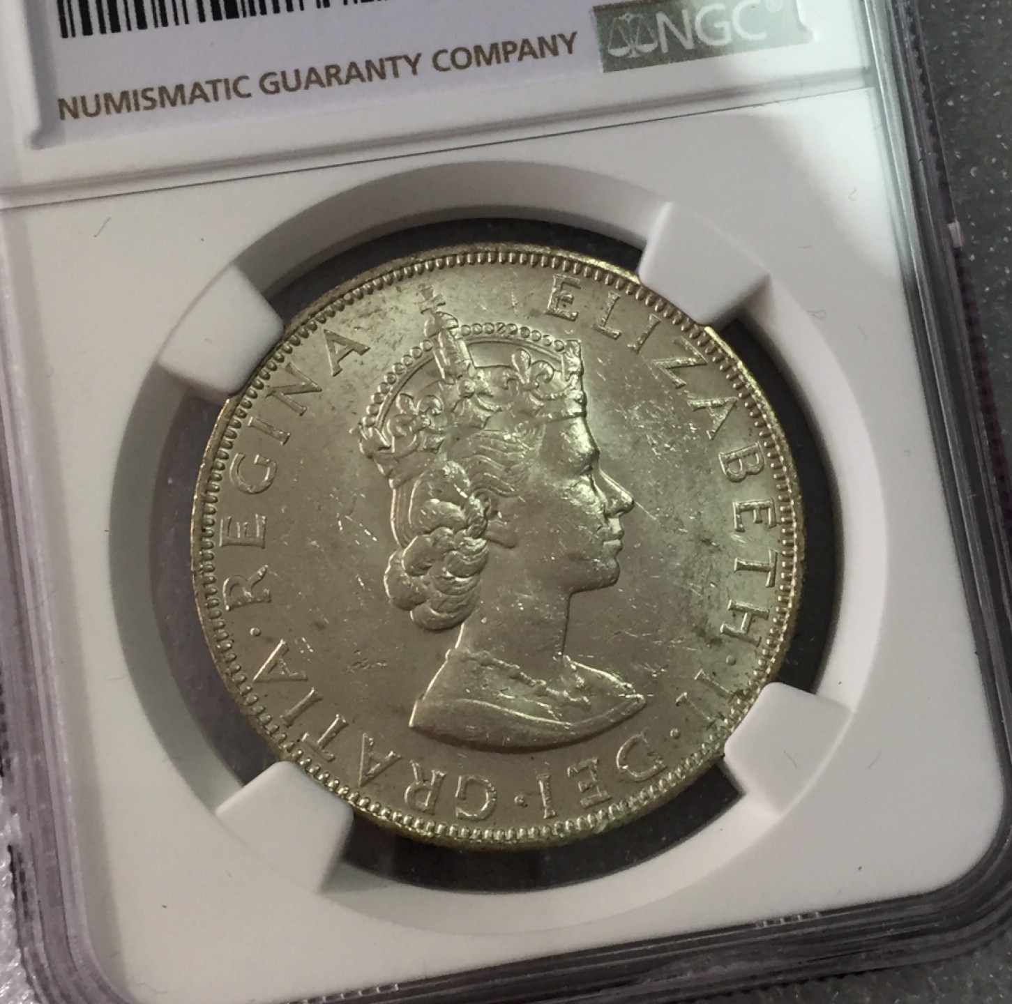 方圆集藏第三期专场 8003-NGC60英属百慕大1964年1克朗银币