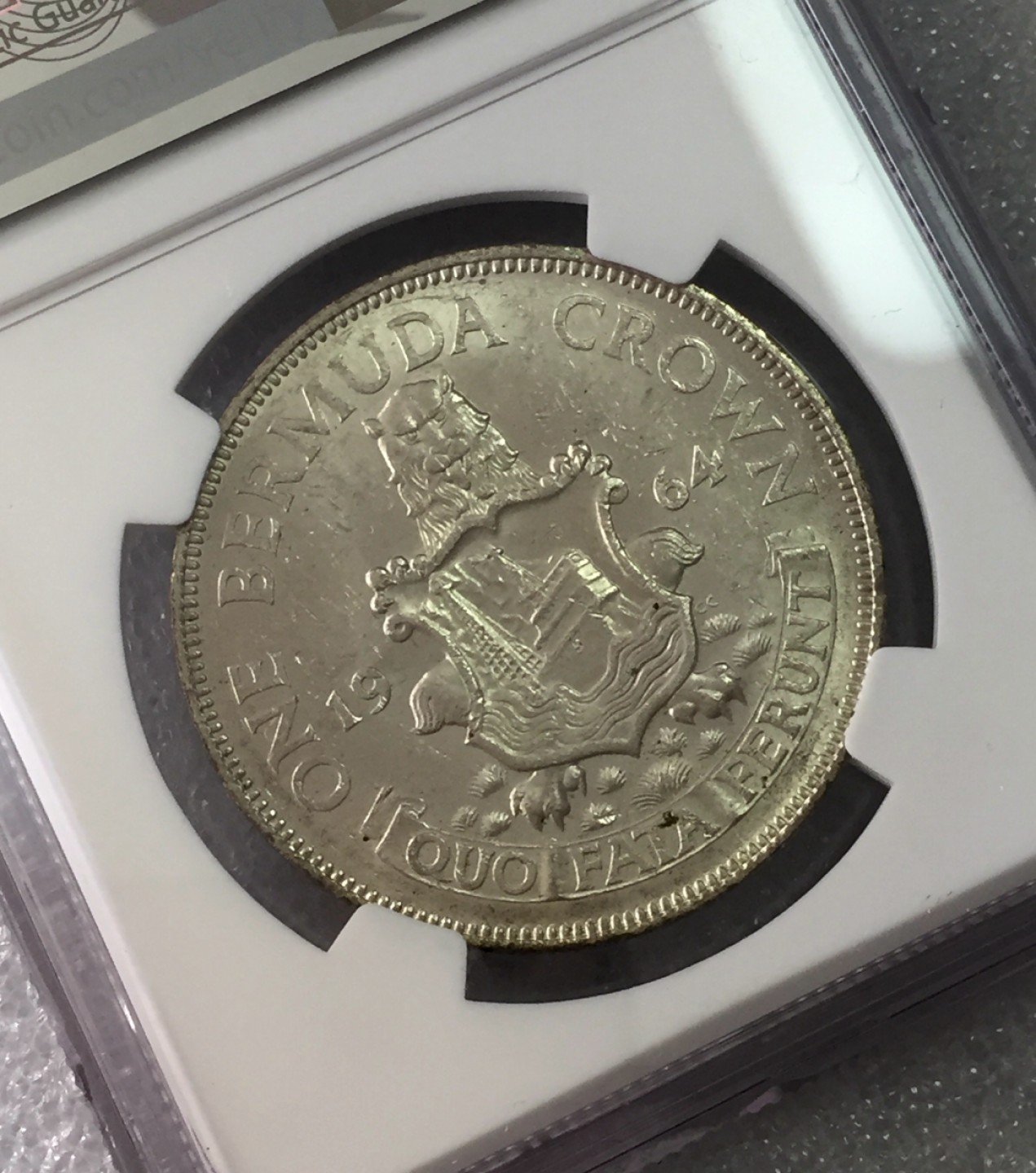 方圆集藏第三期专场 8003-NGC60英属百慕大1964年1克朗银币