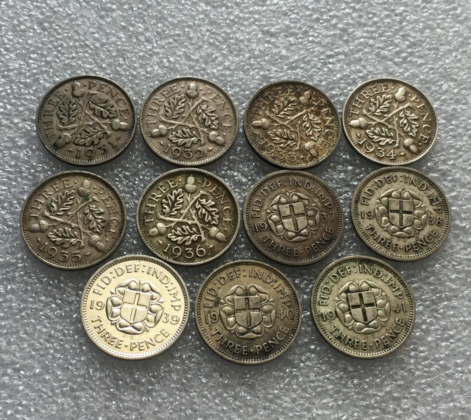 方圆集藏第三期专场 6785-英国1931-1941年乔五乔六3便士连号银币11枚