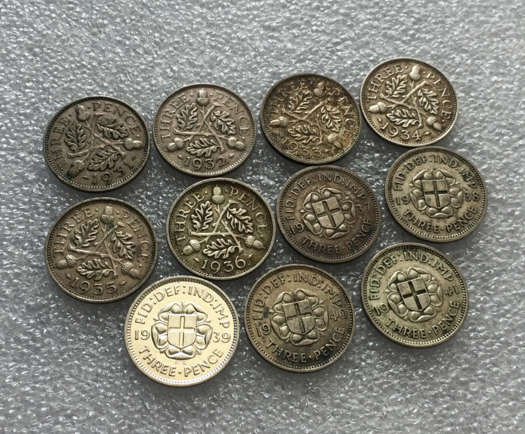 方圆集藏第三期专场 6785-英国1931-1941年乔五乔六3便士连号银币11枚