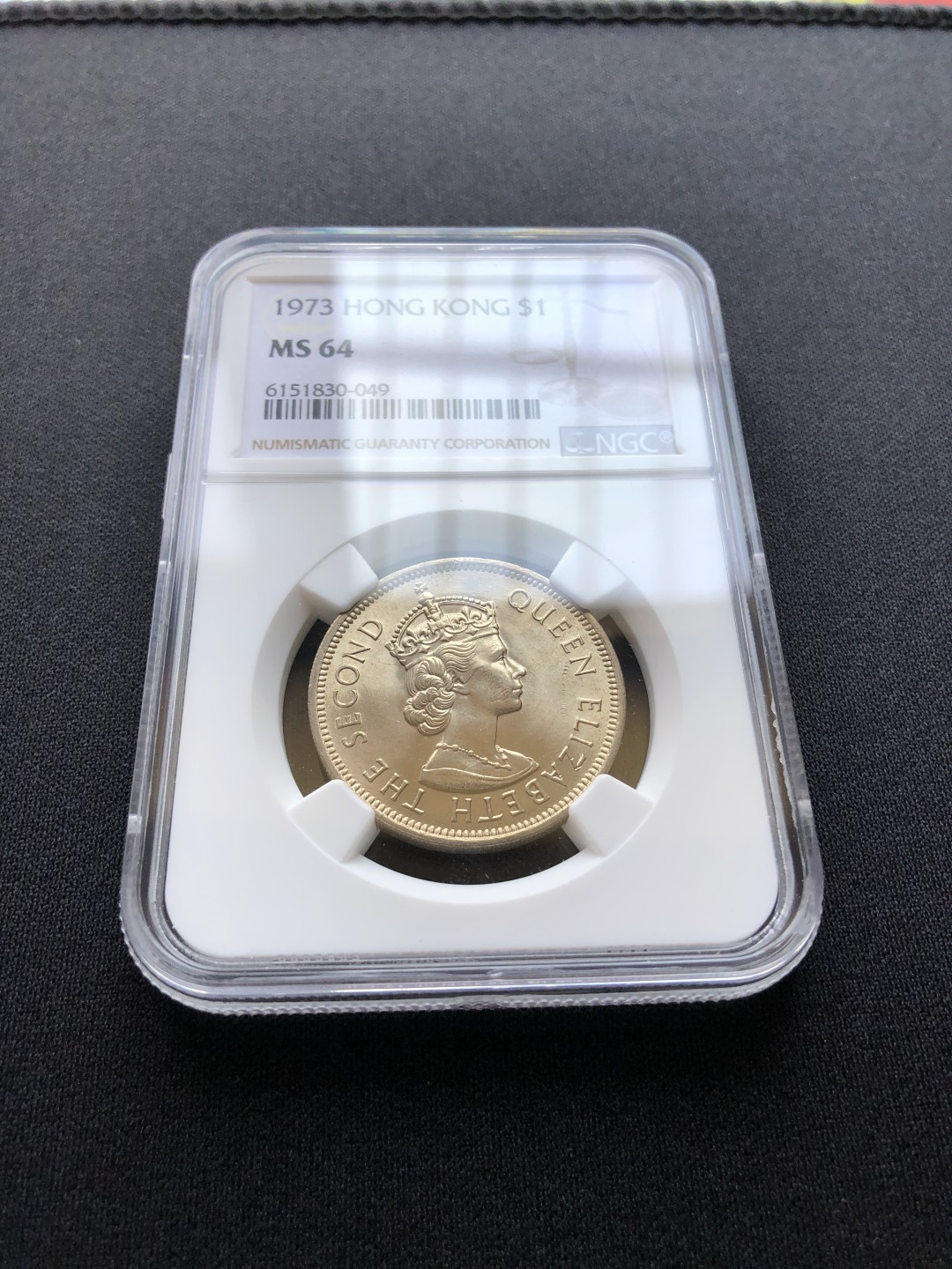 【Valley Gallery Auction】澳门纸币靓号【豹子/狮子/AA/补号】专场 [第一期] 1973香港大壹元，NGC MS64【原卷-卷拆全新送评】（车轮光十足）