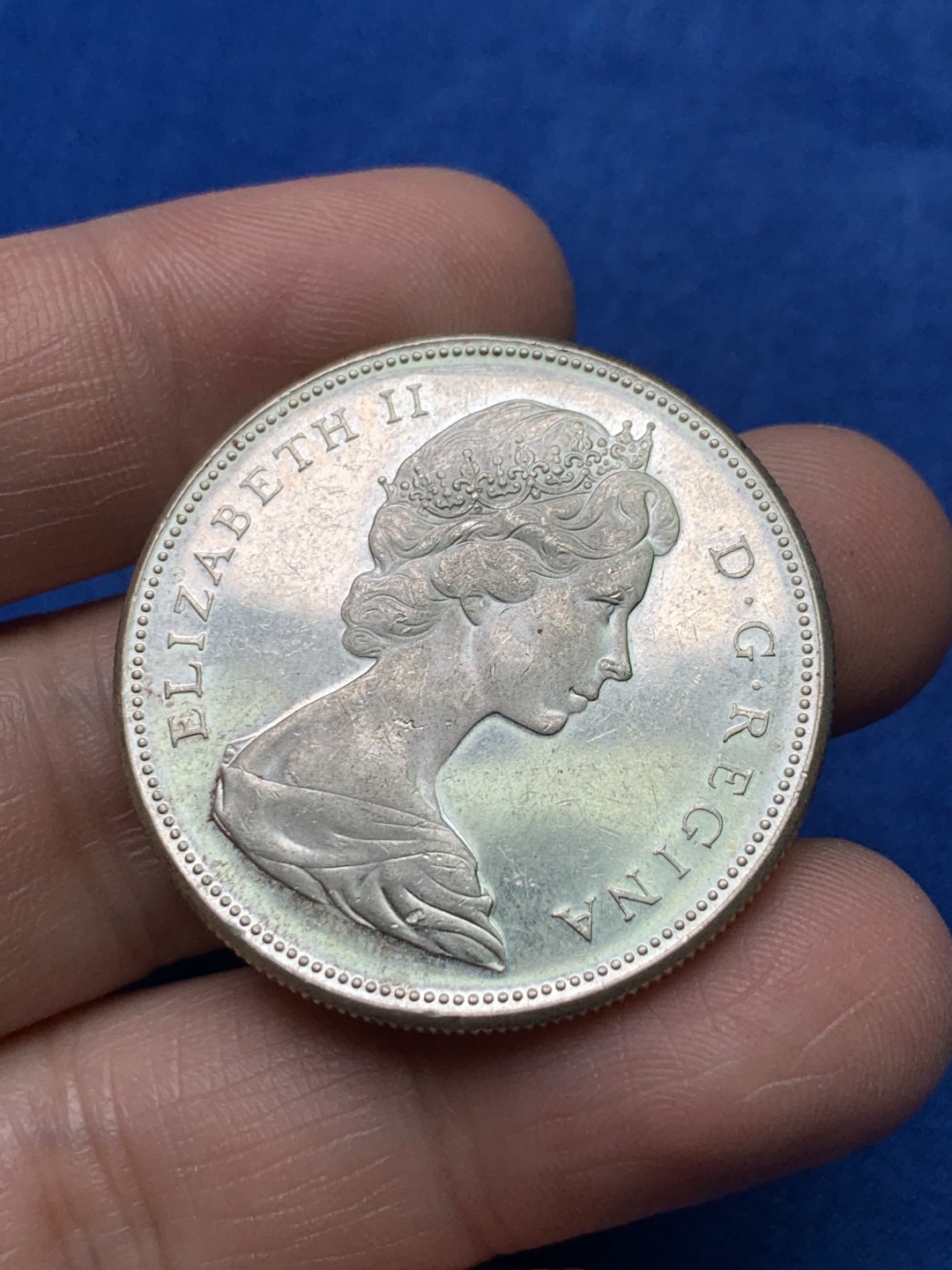 《竞宝斋》三少爷老婆本专场-第156场 (全场包邮) 加拿大1967年大雁1元银币，原光可评级好品相