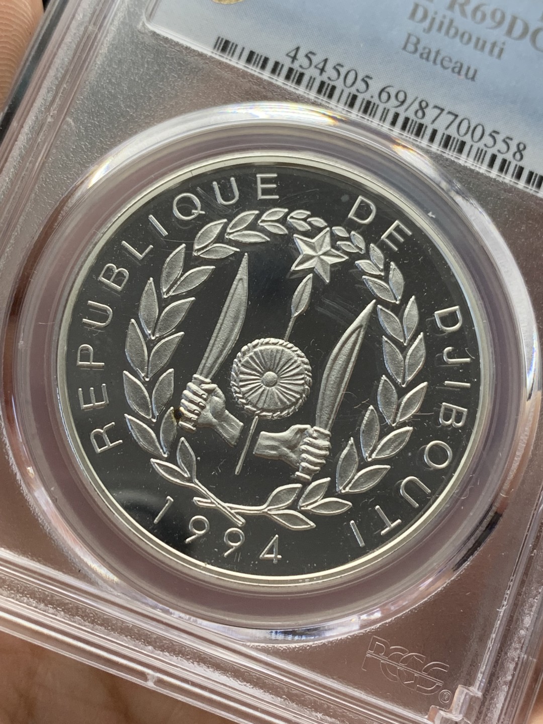 《竞宝斋》三少爷老婆本专场-第156场 (全场包邮) PCGS金盾 PR69DCAM 吉布提1994年100法郎精制大银币