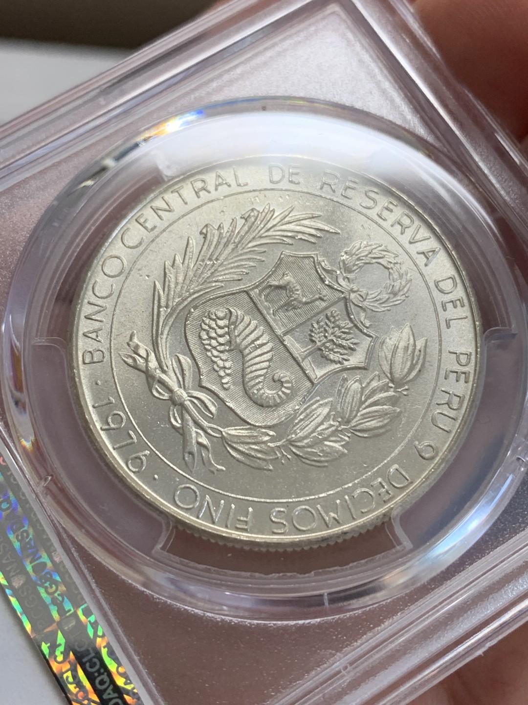 《竞宝斋》三少爷老婆本专场-第156场 (全场包邮) PCGS金盾 MS65 秘鲁1976年阿亚库乔战役150周年纪念400索尔大银币。900银，直径35.5mm，重量28.1g