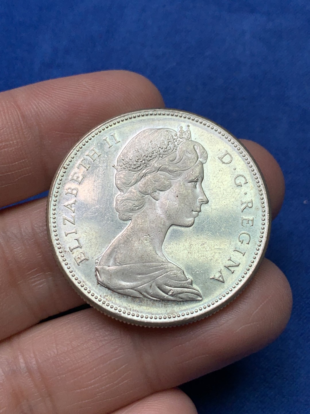 《竞宝斋》三少爷老婆本专场-第156场 (全场包邮) 加拿大1967年大雁1元银币，原光可评级好品相