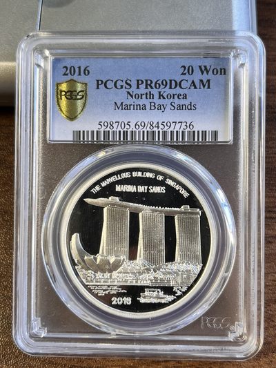 【海寧潮E】朝鲜2016年新加坡币展1盎司纪念银币PCGS-PR69,999银，39毫米