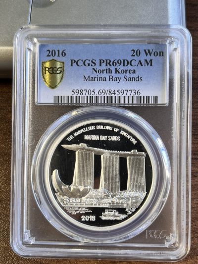 【海寧潮E】朝鲜2016年新加坡币展1盎司纪念银币PCGS-PR69,999银，39毫米