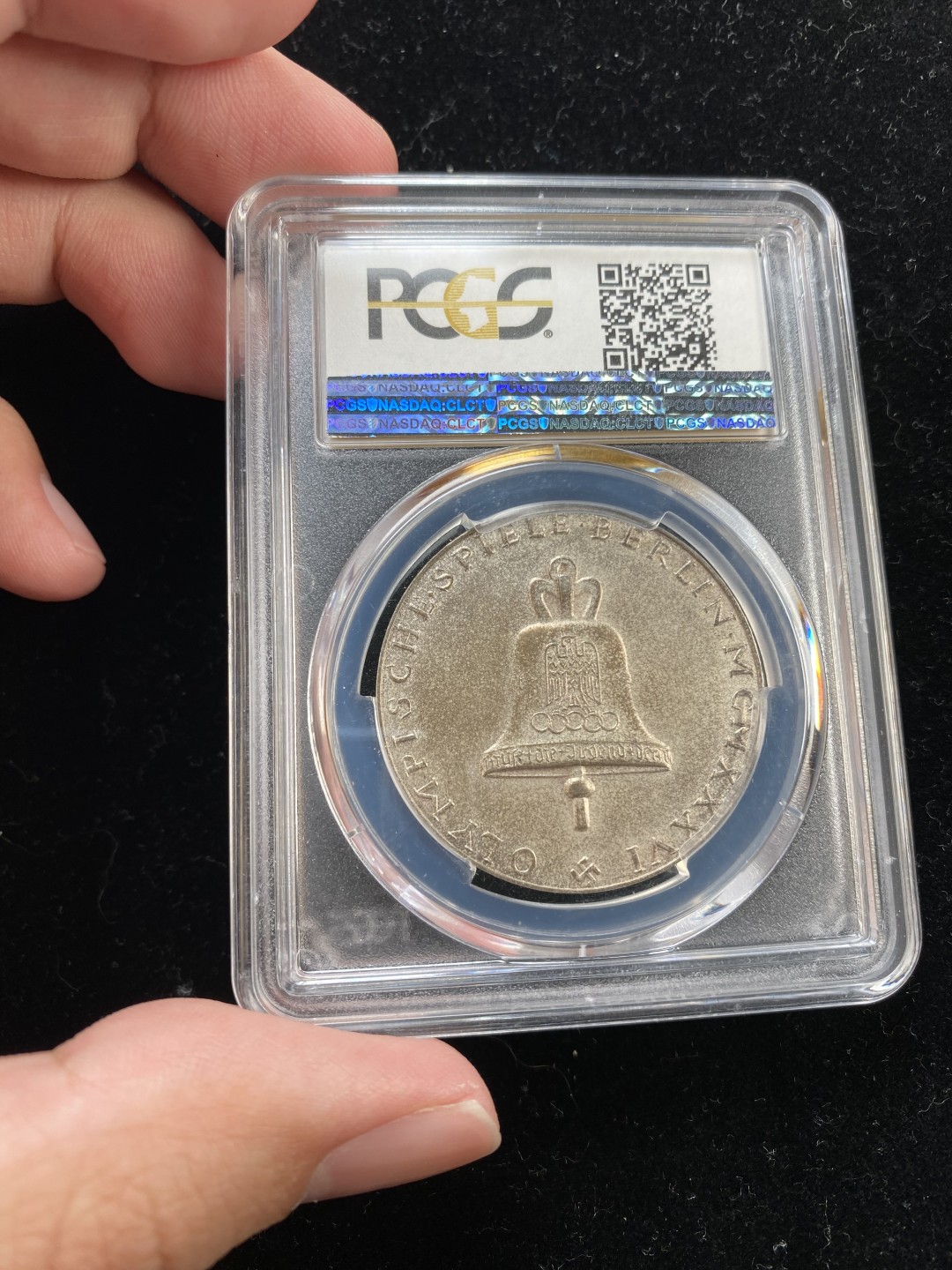 万国钱币拍卖第006期（慕尼黑币展之夜） PCGS SP64德国1936柏林奥运会纪念银章，原盒原味，亚军分，注意PCGS对于章描述的SP是Special process特殊工艺的意思，与样币或者样章没任何关系