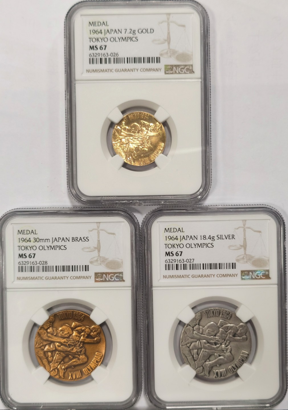 博洋堂世界钱币拍卖第024期（全场包邮） NGC MS67 日本1964年东京奥运会金、银、铜纪念章三枚一套 金章7.2g 一套同分很难得