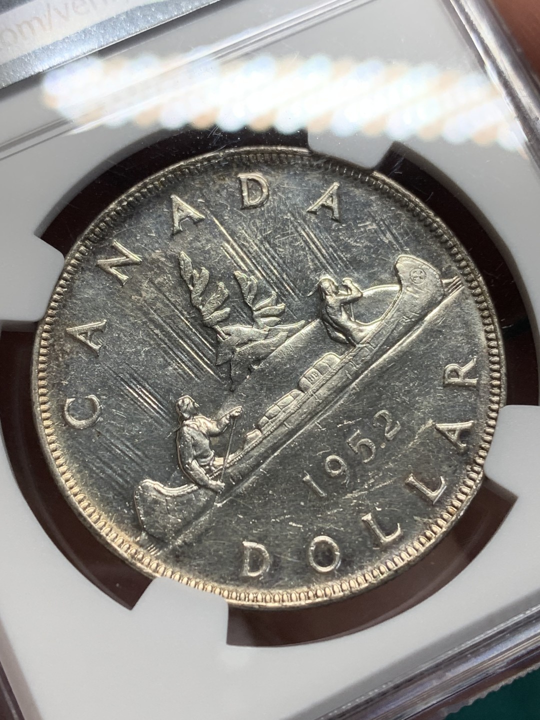 《竞宝斋》第159场-周日，周一 2场 (全场包邮) NGC AU58 加拿大 1952 一元划船银币 镜面效果非常好