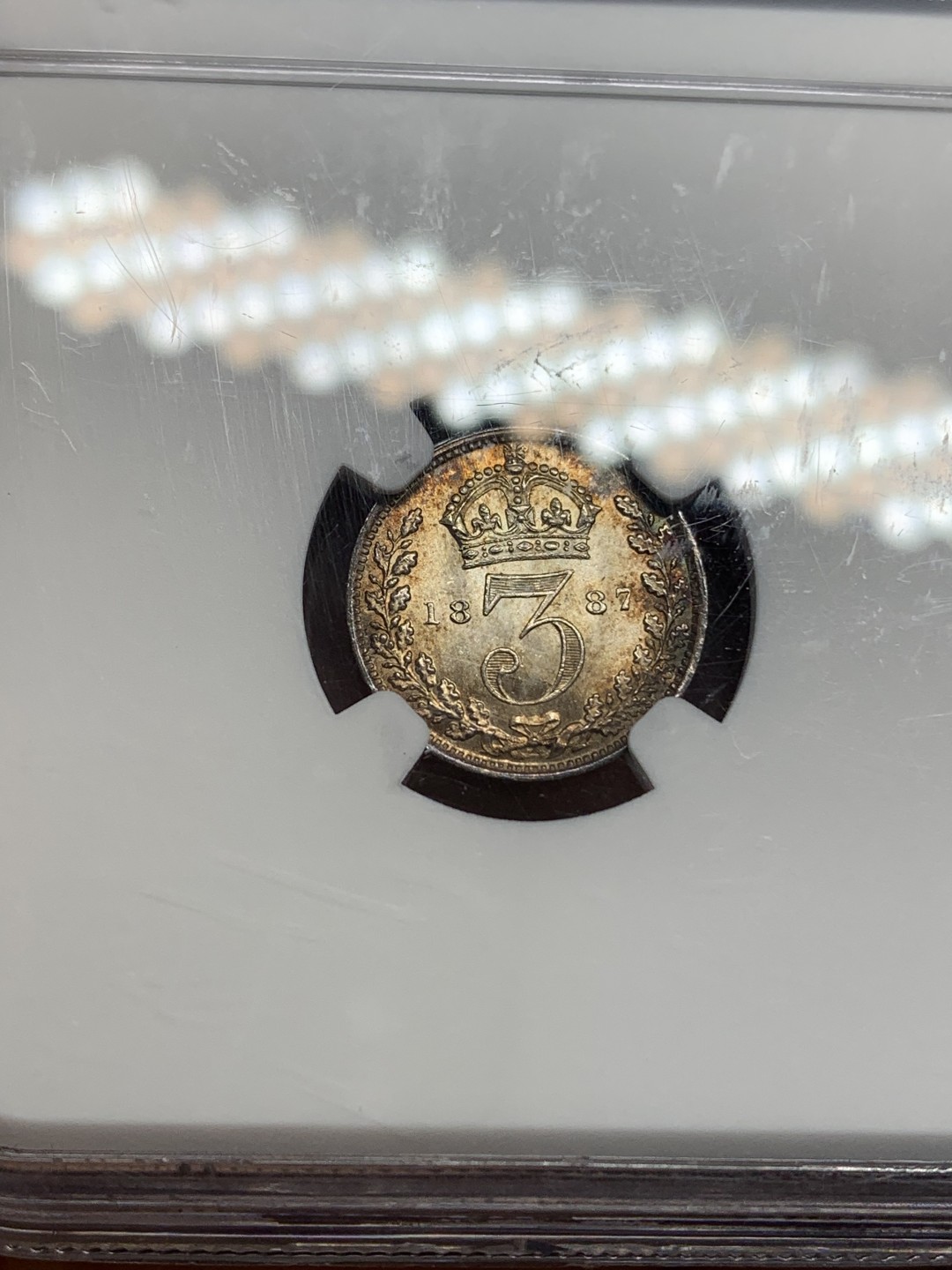 《竞宝斋》第159场-周日，周一 2场 (全场包邮) NGC-MS65 英国1887年维多利亚高冠三便士，原始彩浆，光度一流