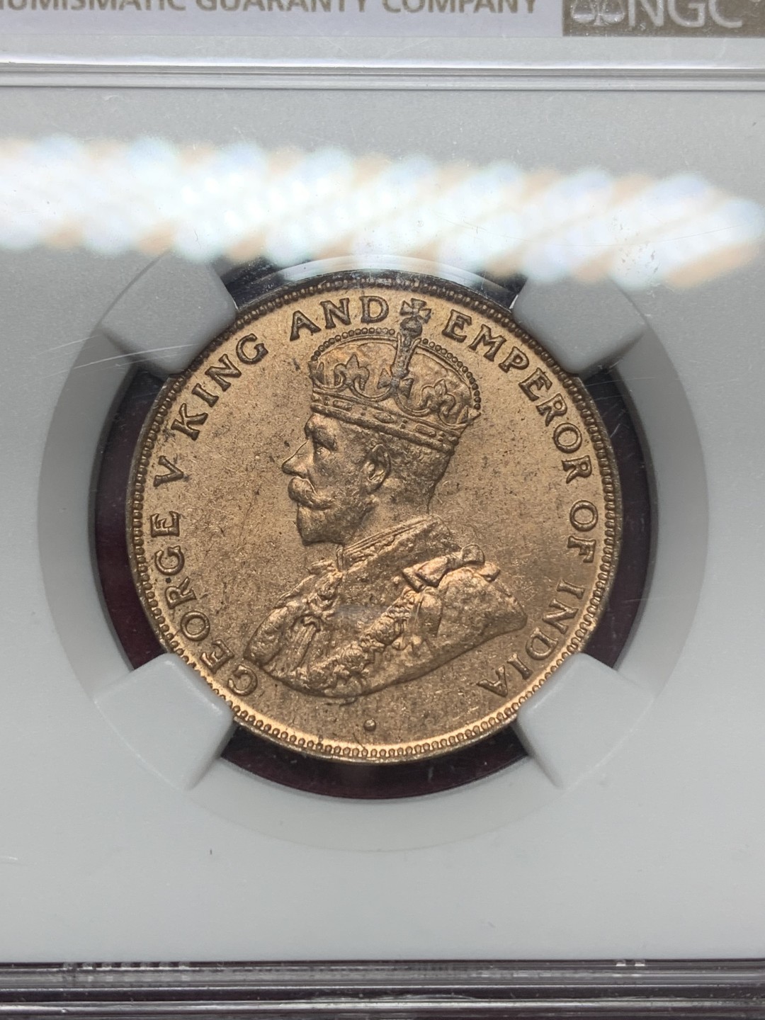 《竞宝斋》第159场-周日，周一 2场 (全场包邮) NGC-UNCD 中国 香港 乔治五世 1925年 一仙铜币 极品原光 背面一小块脏东西非常可惜 整体63状态