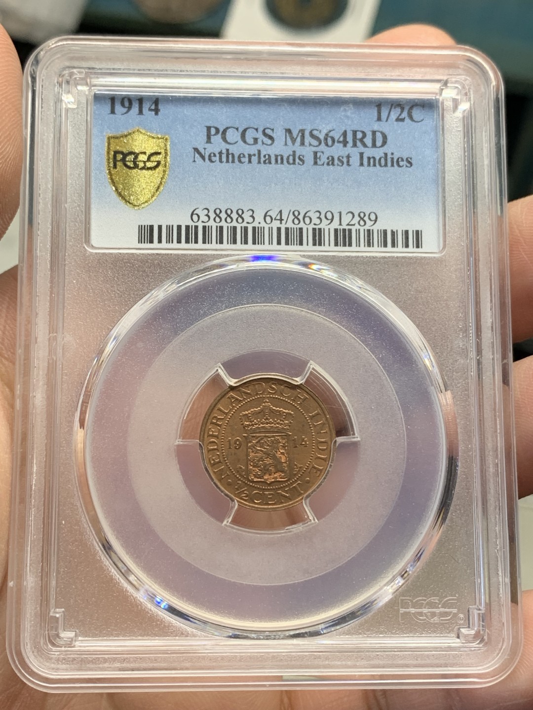 《竞宝斋》第159场-周日，周一 2场 (全场包邮) PCGS-MS64RD 唯一冠军分 1914年 荷属东印度1/2C铜币，RD冠军品质，红铜光靓丽。不是后期常见的194x版，较早年份的荷属东印度都少见