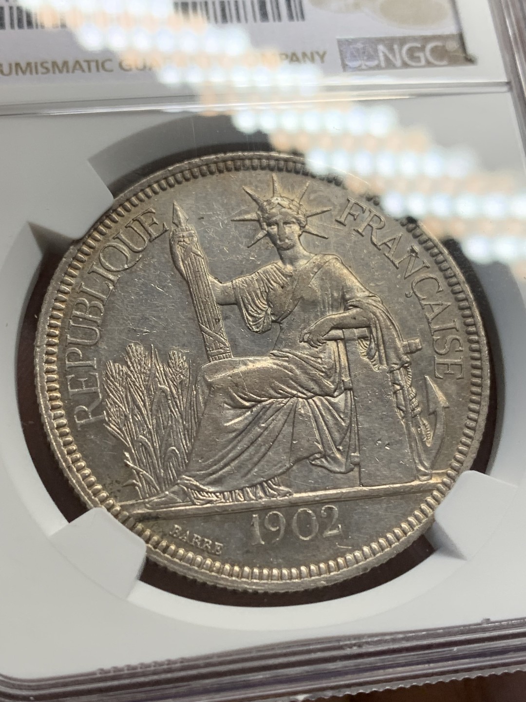 《竞宝斋》第159场-周日，周一 2场 (全场包邮) NGC-AU55 法属印度支那 1902年 1皮亚斯特 坐洋价格稳步上升，此枚略有低评，上车坐洋的不二之选