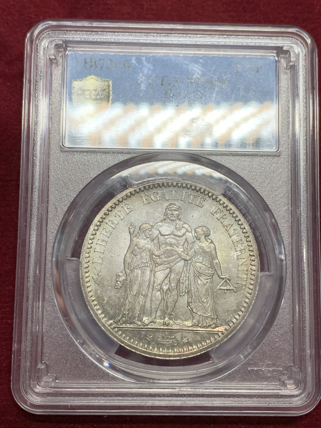 《竞宝斋》第159场-周日，周一 2场 (全场包邮) PCGS-MS64 法国 1873 大力神5法郎大银币。转光流畅的一颗，底板丝滑。老欧洲包浆，背面绚彩，盒子背面小磕