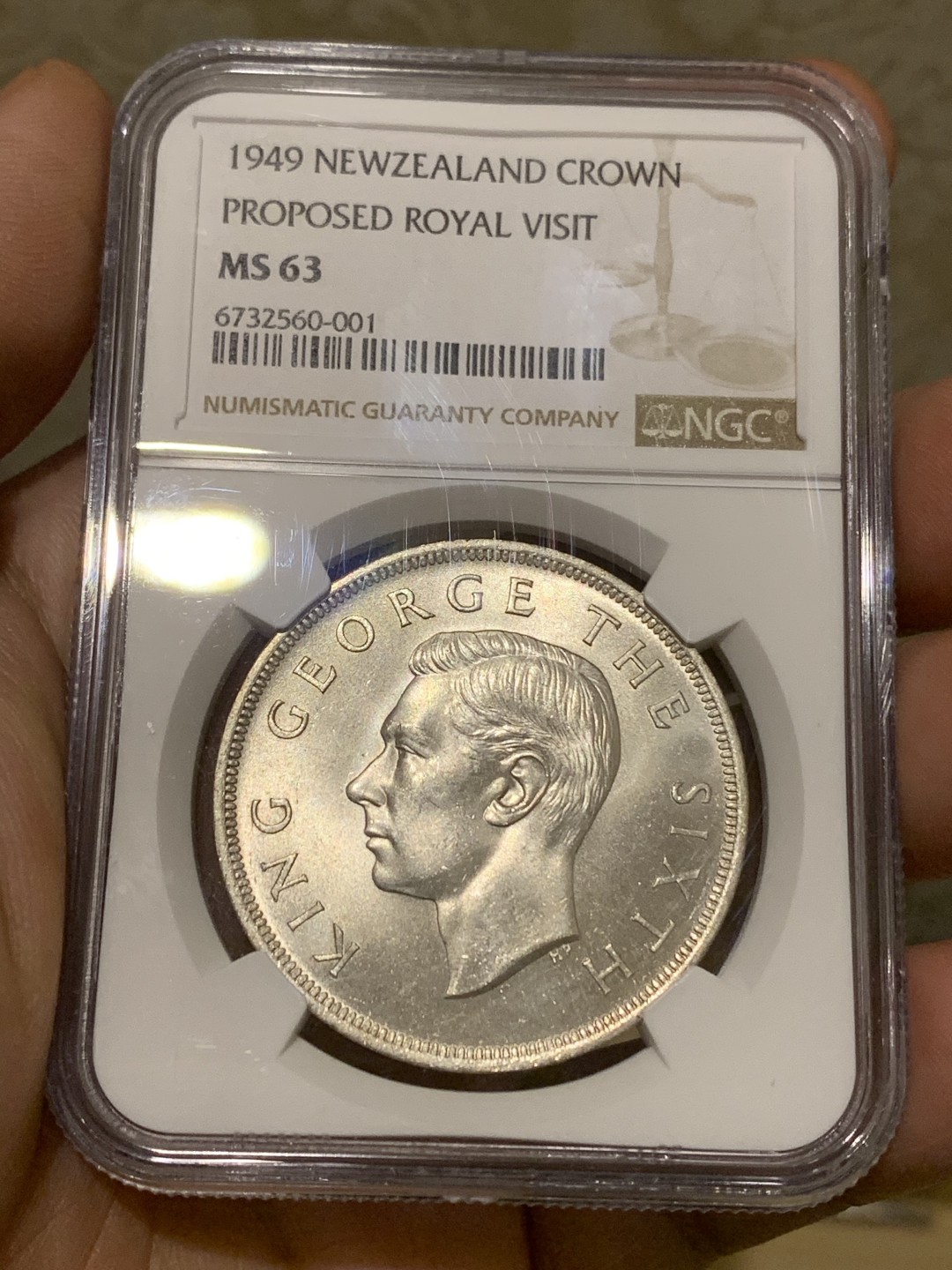 《竞宝斋》第159场-周日，周一 2场 (全场包邮) NGC MS63 新西兰 1949 乔六克朗大银币，背面新西兰国花银蕨，全转光品相