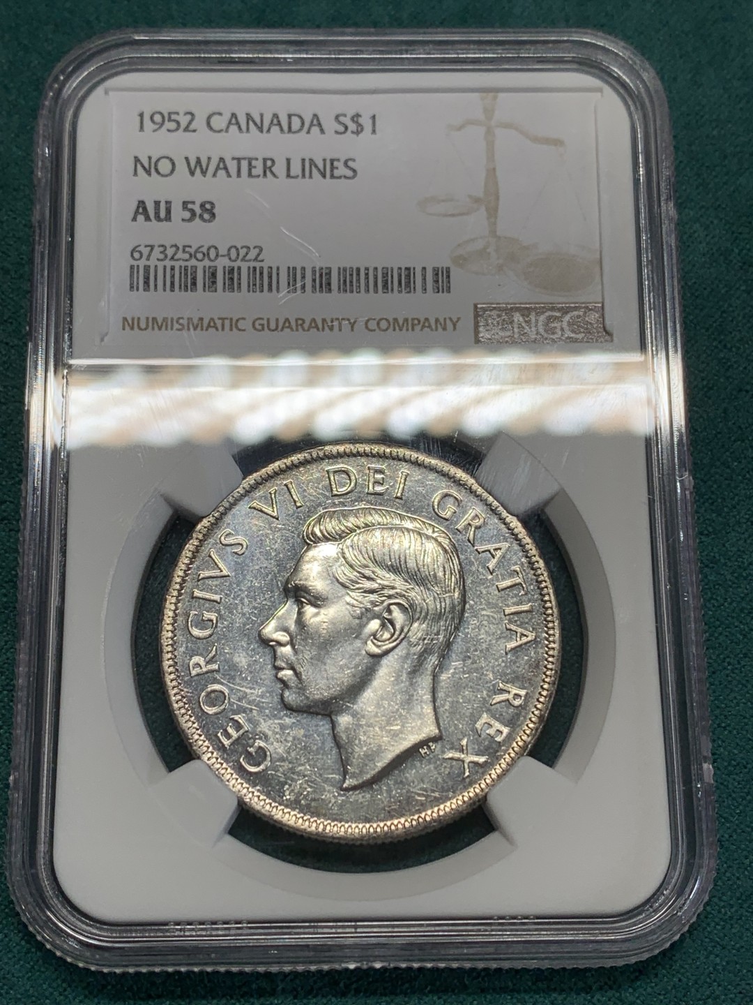 《竞宝斋》第159场-周日，周一 2场 (全场包邮) NGC AU58 加拿大 1952 一元划船银币 镜面效果非常好