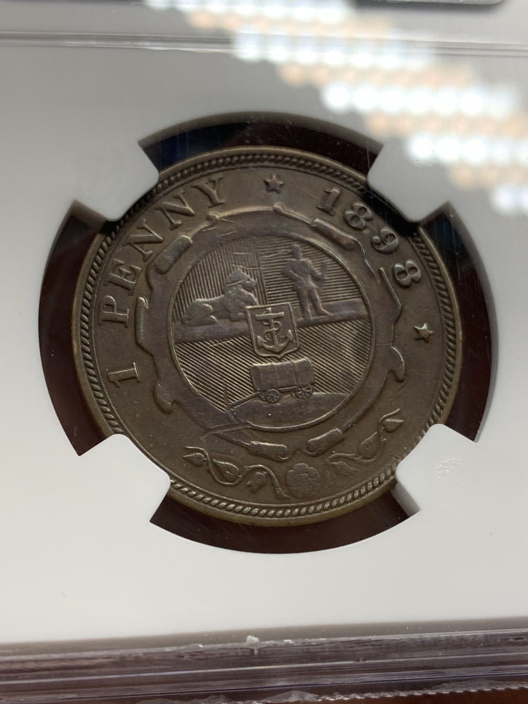 《竞宝斋》第159场-周日，周一 2场 (全场包邮) NGC-AU53 1898南非1便士铜币