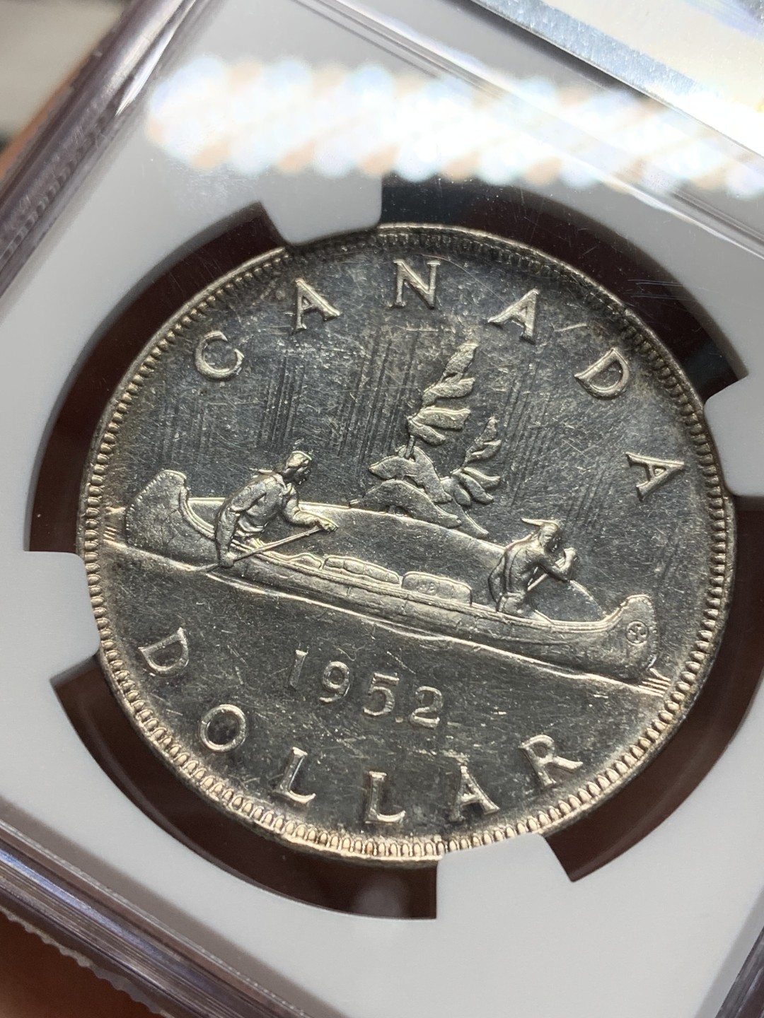 《竞宝斋》第159场-周日，周一 2场 (全场包邮) NGC AU58 加拿大 1952 一元划船银币 镜面效果非常好