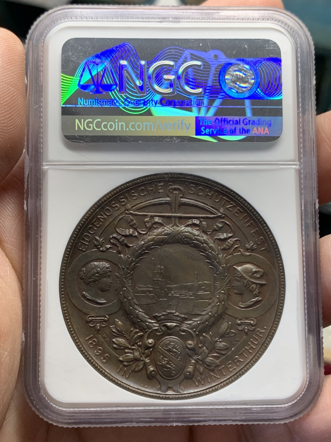 《竞宝斋》第159场-周日，周一 2场 (全场包邮) NGC-MS62 1895年 瑞士温图尔特射击节铜章 45mm满盒大铜，手感厚重。刻画精美的拿花女神