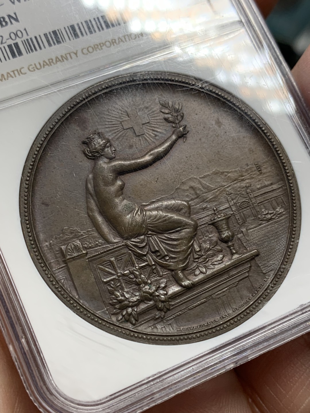 《竞宝斋》第159场-周日，周一 2场 (全场包邮) NGC-MS62 1895年 瑞士温图尔特射击节铜章 45mm满盒大铜，手感厚重。刻画精美的拿花女神