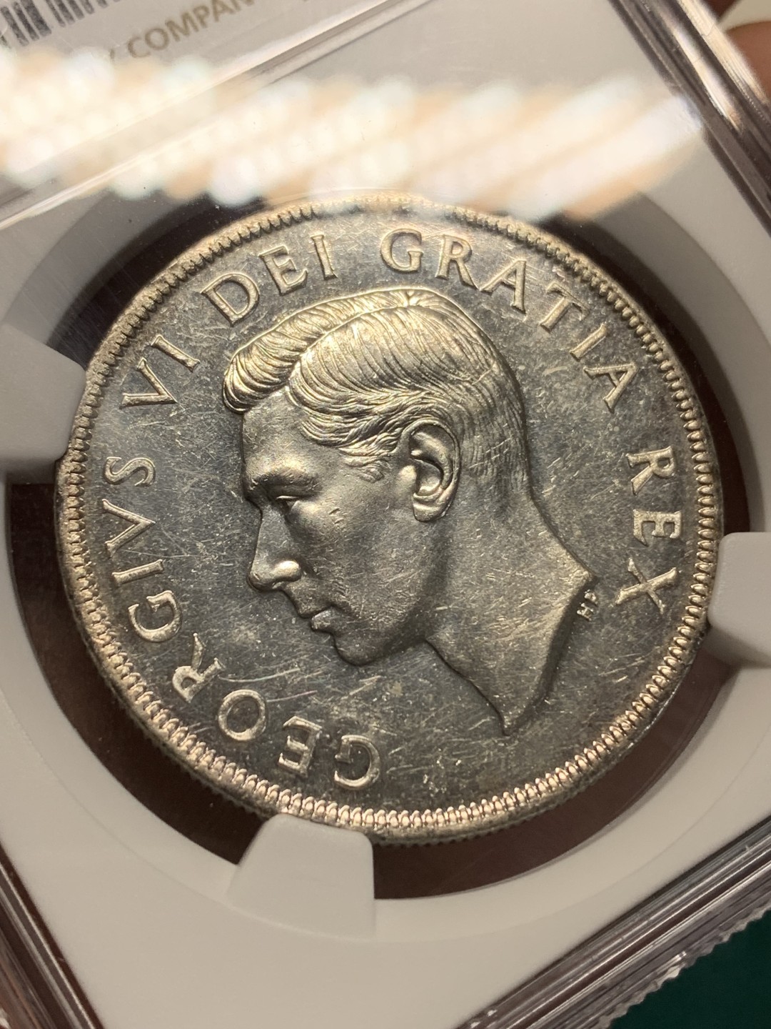 《竞宝斋》第159场-周日，周一 2场 (全场包邮) NGC AU58 加拿大 1952 一元划船银币 镜面效果非常好