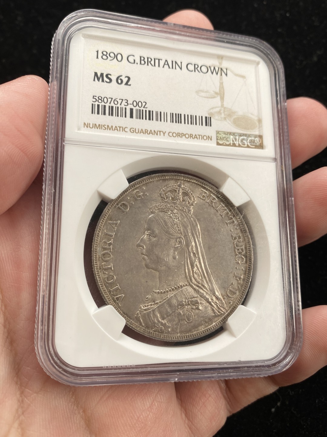 万国钱币拍卖第007期（慕尼黑第二夜） NGC-MS62 英国1890年高冠马剑克朗大银，英系热门品种，少见年份，灰彩包浆，打制清晰，高点俱在，低评状态。