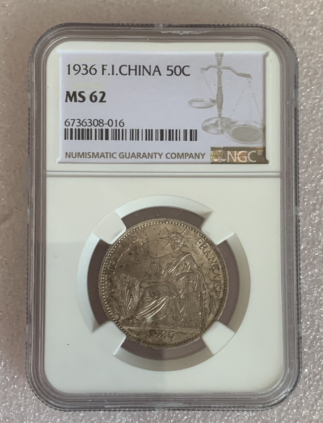 瓶子🏺第89期拍卖会 法属印支1936年50分坐洋银币NGC MS62