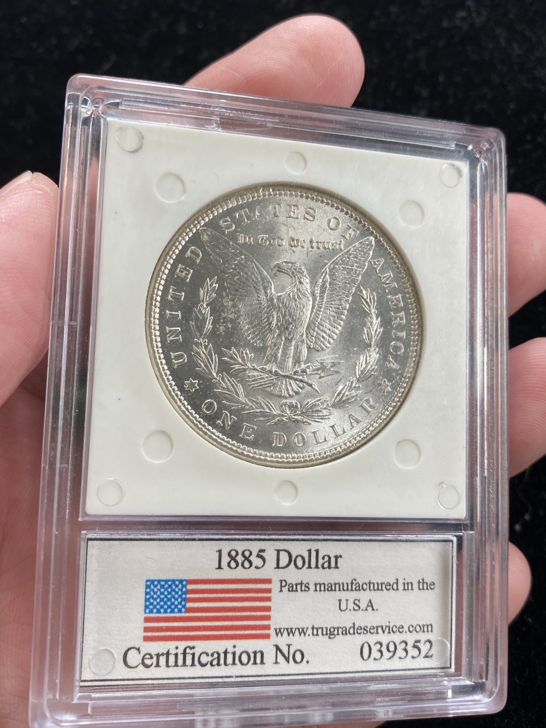 万国钱币拍卖第007期（慕尼黑第二夜） TGS-MS64 美国1885摩根1元，早期评级公司，盒子手感质感很棒，两面清爽，底光强，TGS严评64。