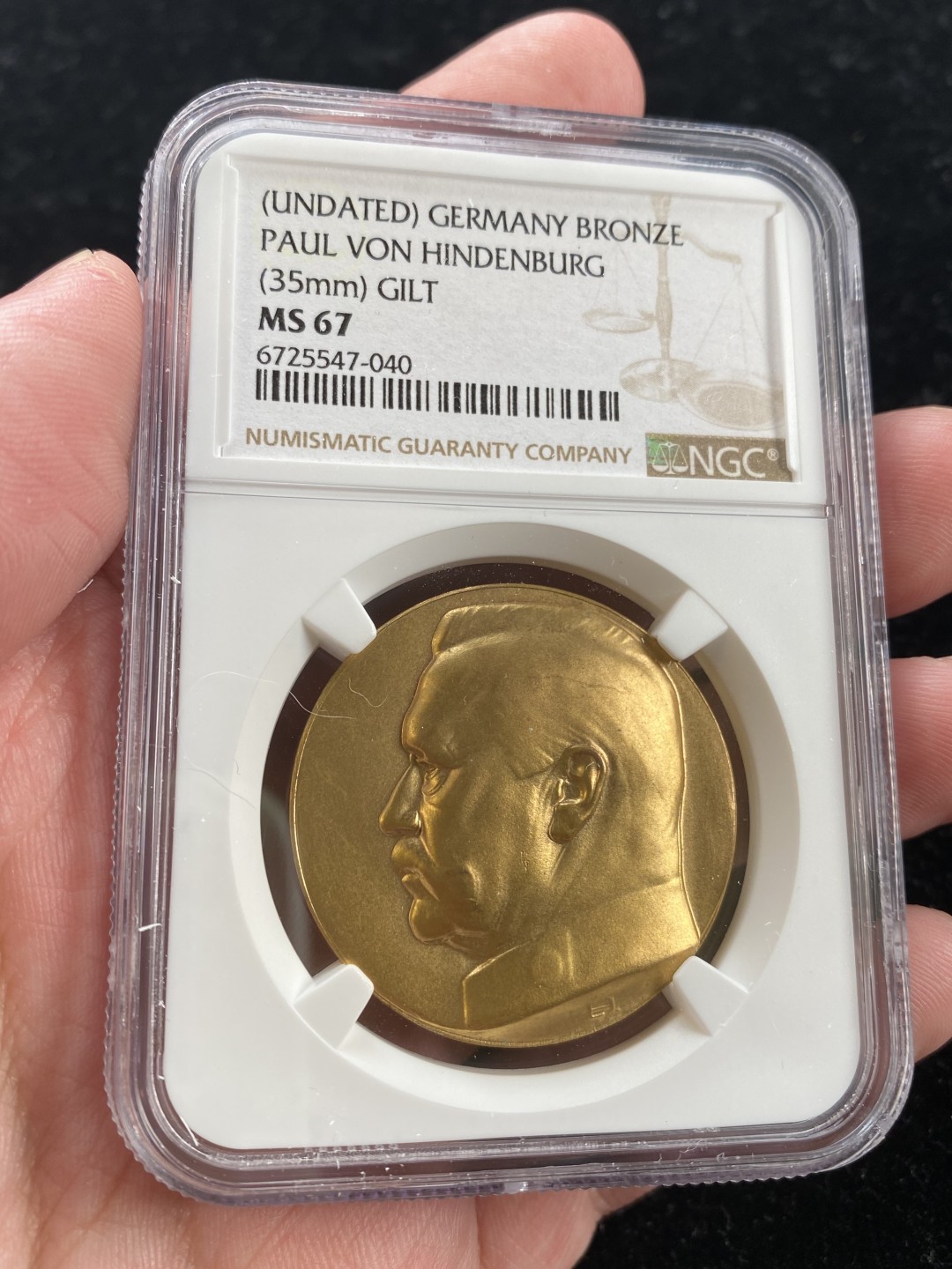 万国钱币拍卖第007期（慕尼黑第二夜） NGC MS67 1925年德国兴登堡当选魏玛共和国总统后首次访问斯图加特纪念镀金铜章，普通品种中的极致品相，唯一最高分
