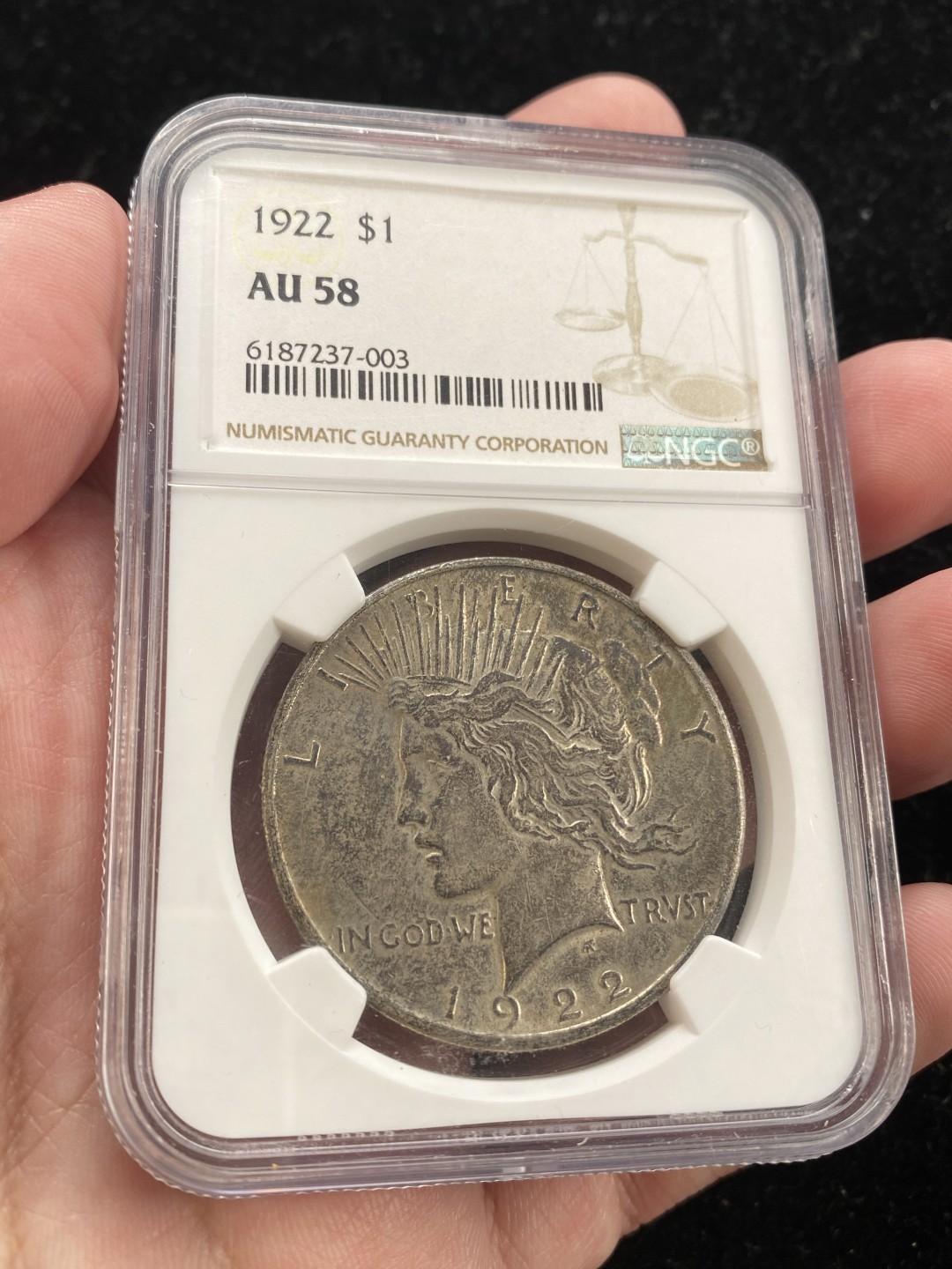 万国钱币拍卖第007期（慕尼黑第二夜） NGC-AU58 美国1922和平银币，黑包浆，摩根在1921关门年份中采用了防氧化材料，后续的和平同样如此，所以1921年后好彩的摩根和平非常少见，此种味道的和平可以作为自己把玩的小精品。